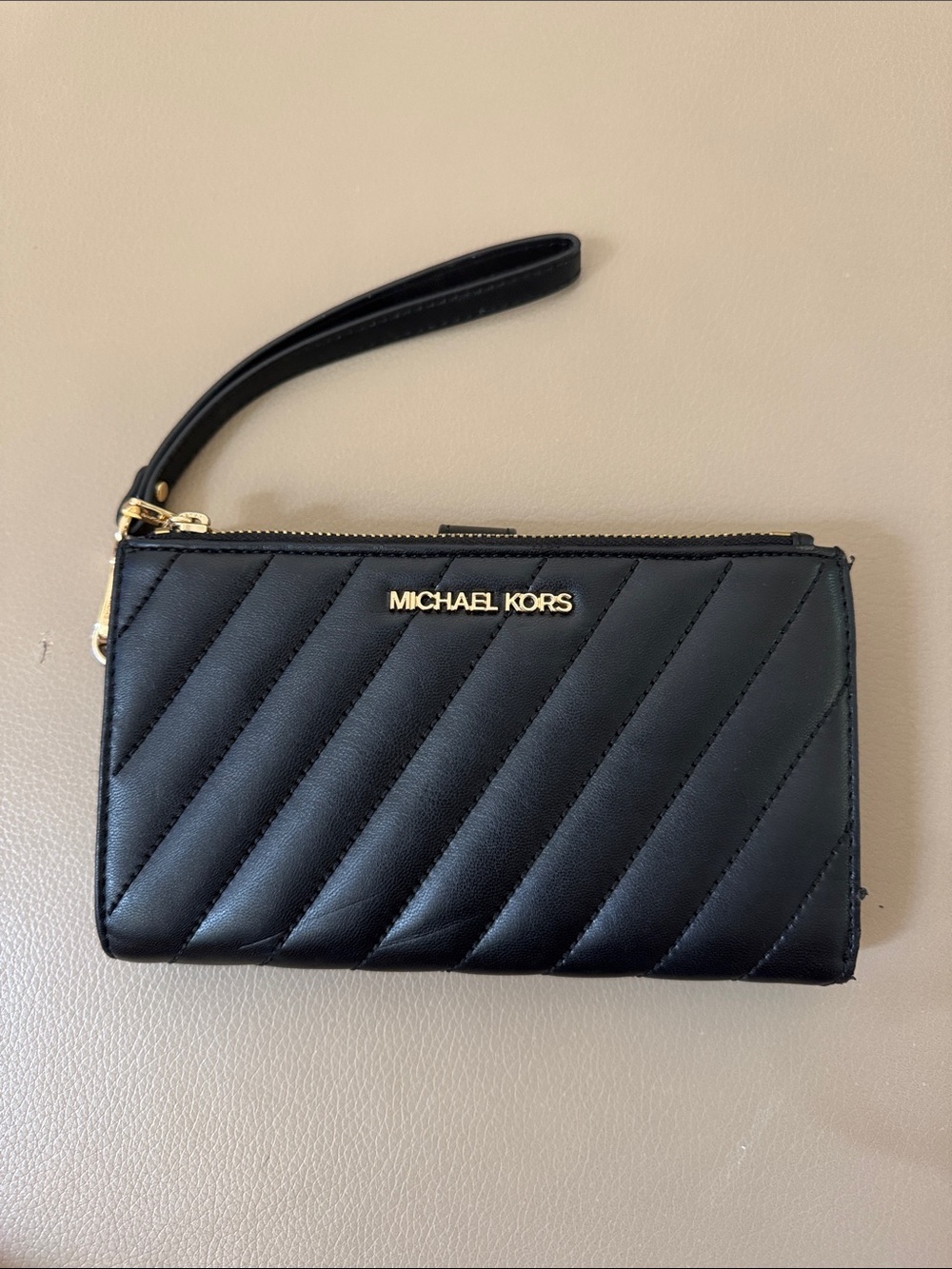 Michael Kors Black Quilted Leather Wristlet with Gold Logo